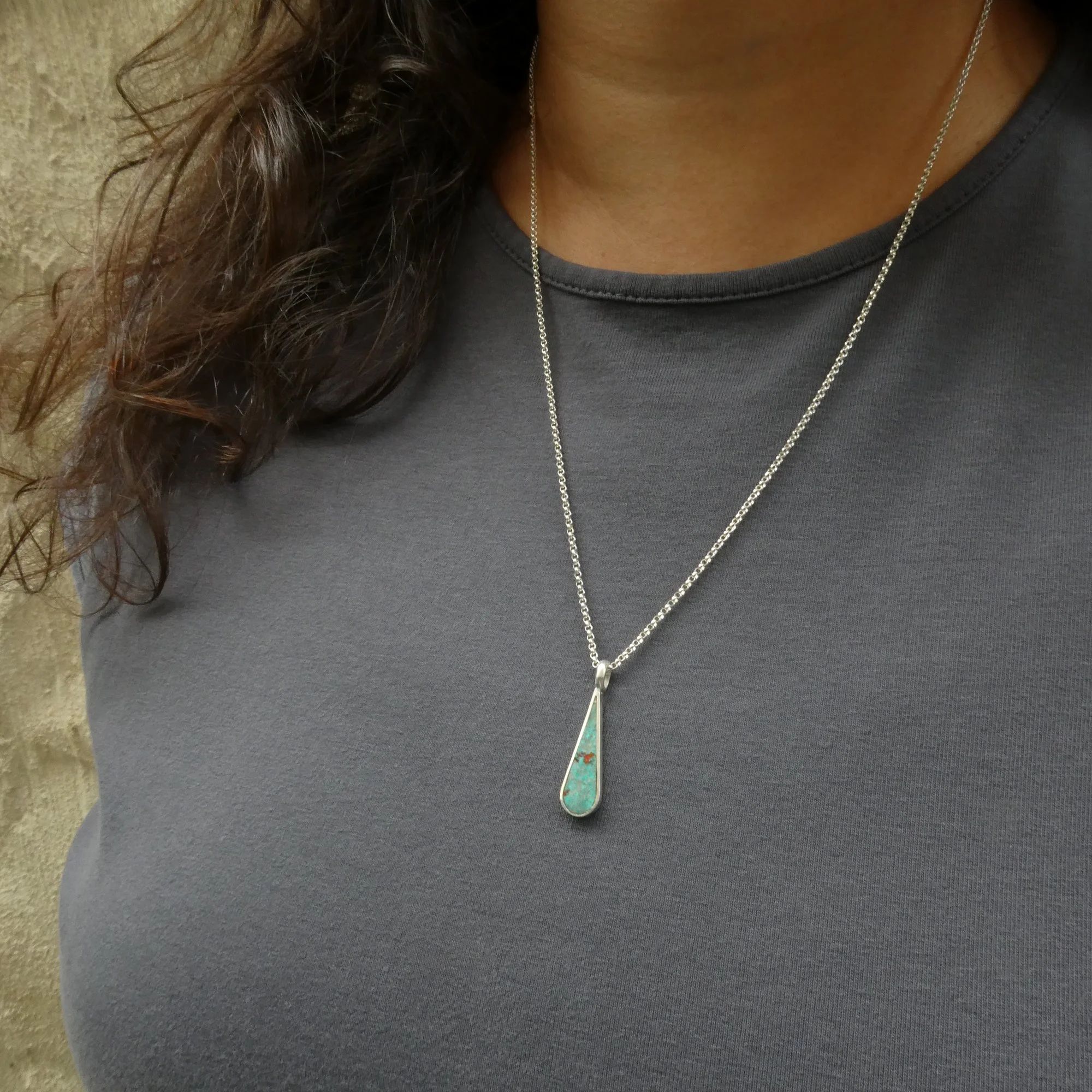 long droplet necklace on body.JPG
