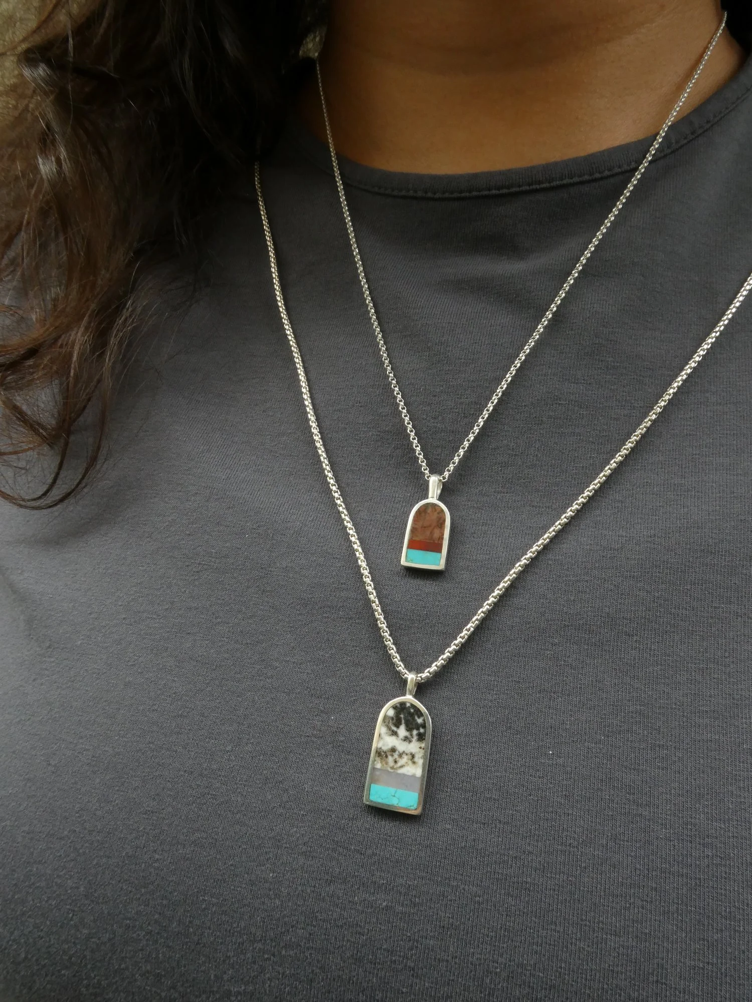 arch pendant size comparison on body.JPG