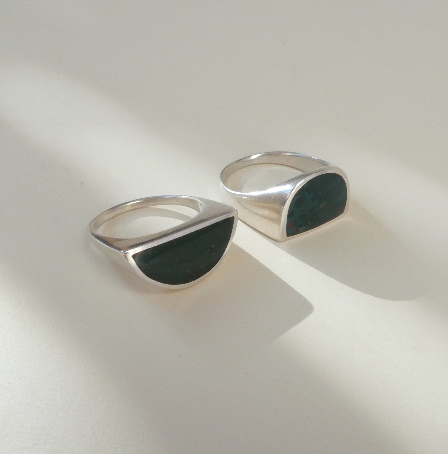 two curve inlay rings with bloodstone.JPG
