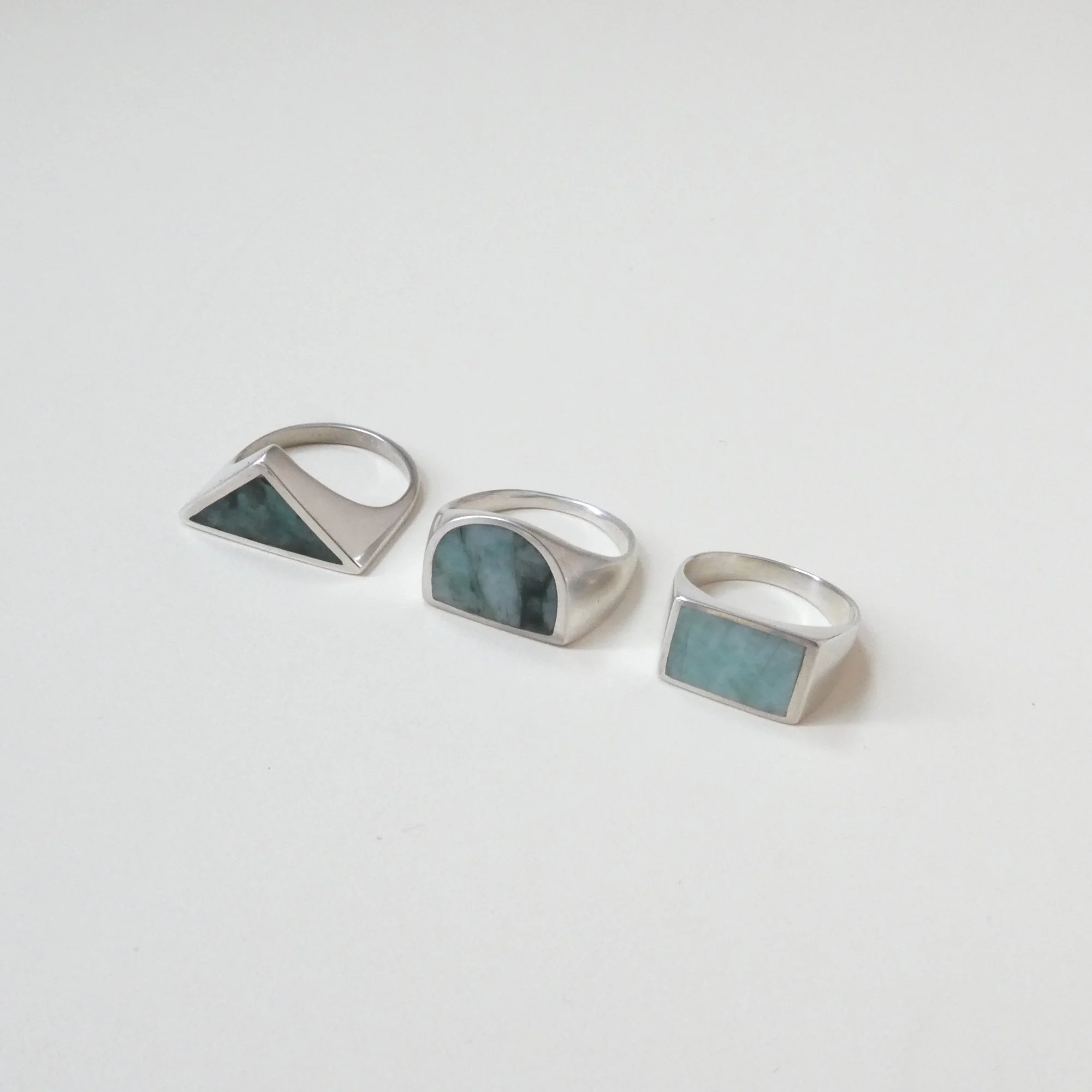 raw emerald variations 3 stone signet ring shapes .JPG
