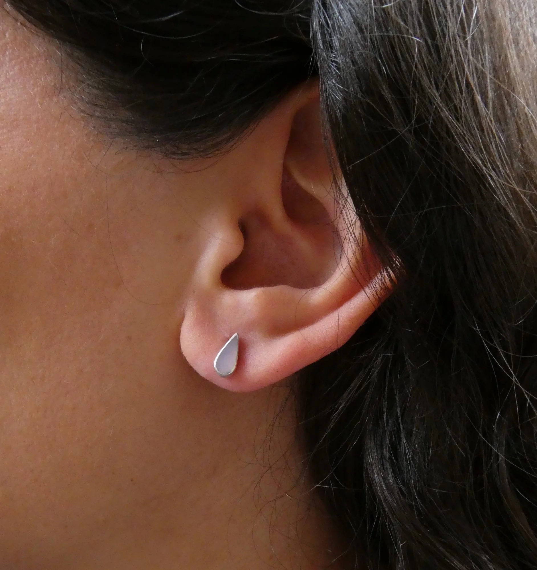 mini tear drop stud on ear.JPG