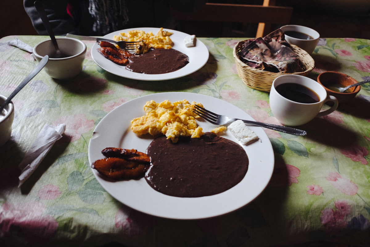 The typical Maya desayuno (breakfast) includes scrambled eggs, black beans, a bit of queso blanco (white cheese), fried maduro plantains and a cup of "cafecito" (coffee). Additionally It’s accompanied by a cloth covered basket of warm tortillas made of corn.