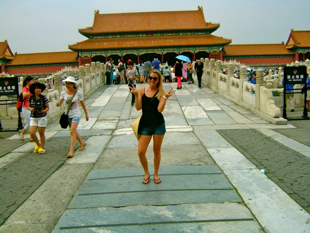 Crossing a bridge in the Forbidden City