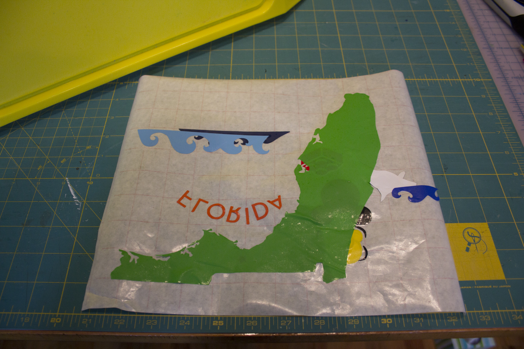 cover with the back of the transfer tape and store. i tape the edges so that it stays flat.
