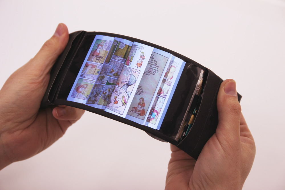 ReFlex (2016): User navigating pages by bending the smartphone; feels pages flip through fingers.