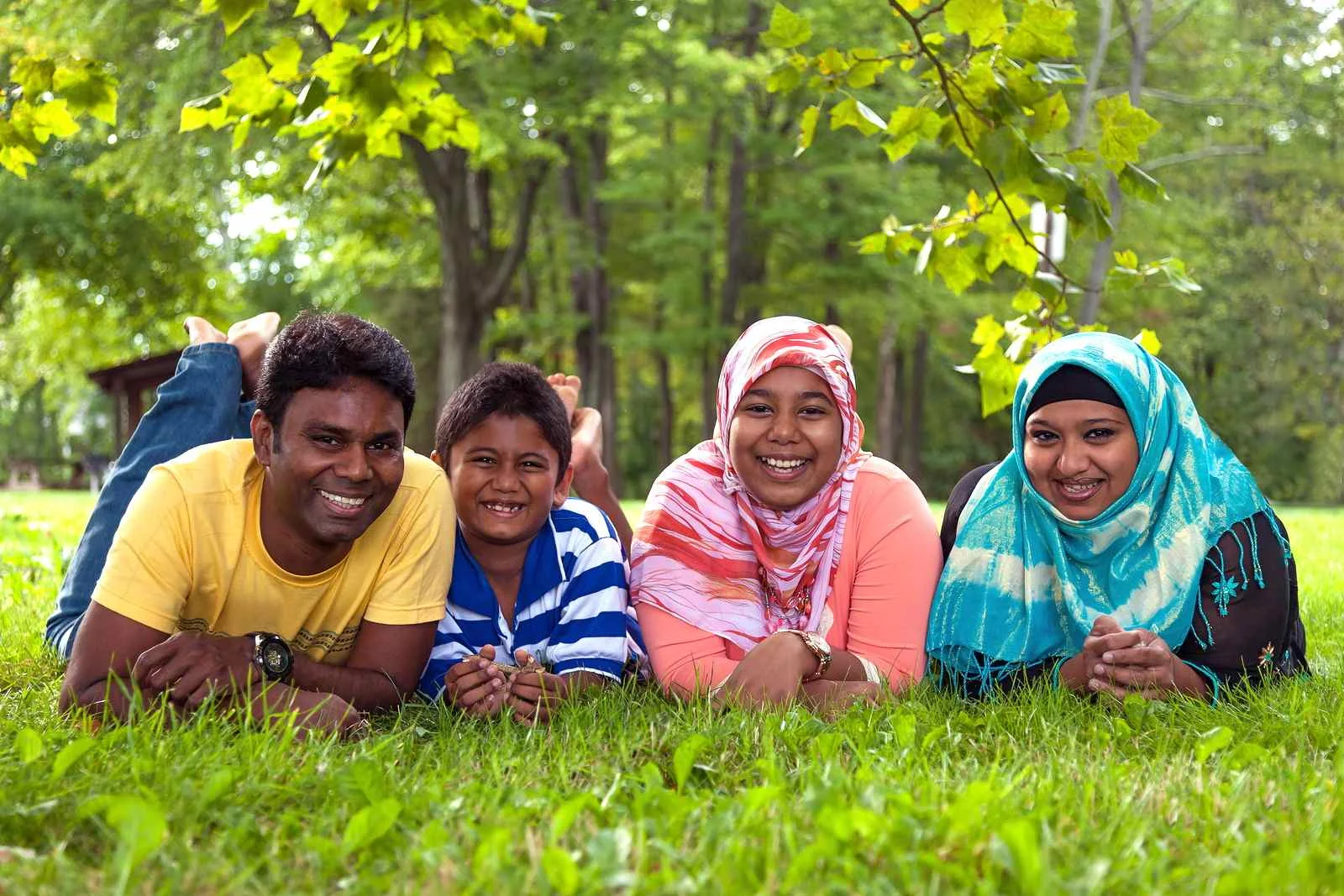 Muslim Family Lying on Grass.jpg