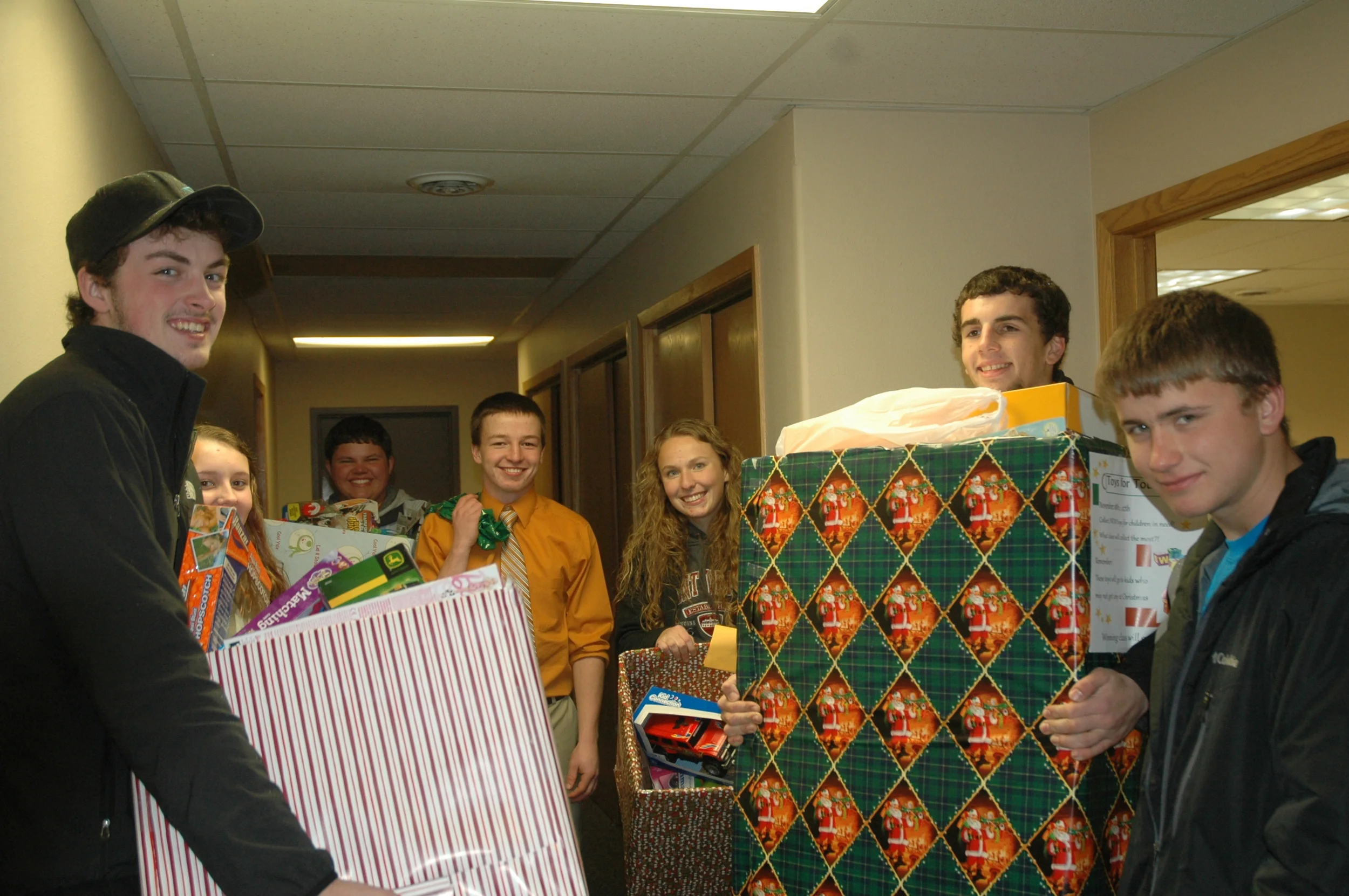 BPA members collected toys today (Dec. 2) for the Toys for Tots Drive. From left: Matthew Quincer, Jessica Langer, Austin Hendershot, Jacob Goeden, Paige Hartman, Isaac Laughlin and Thane Swisse.