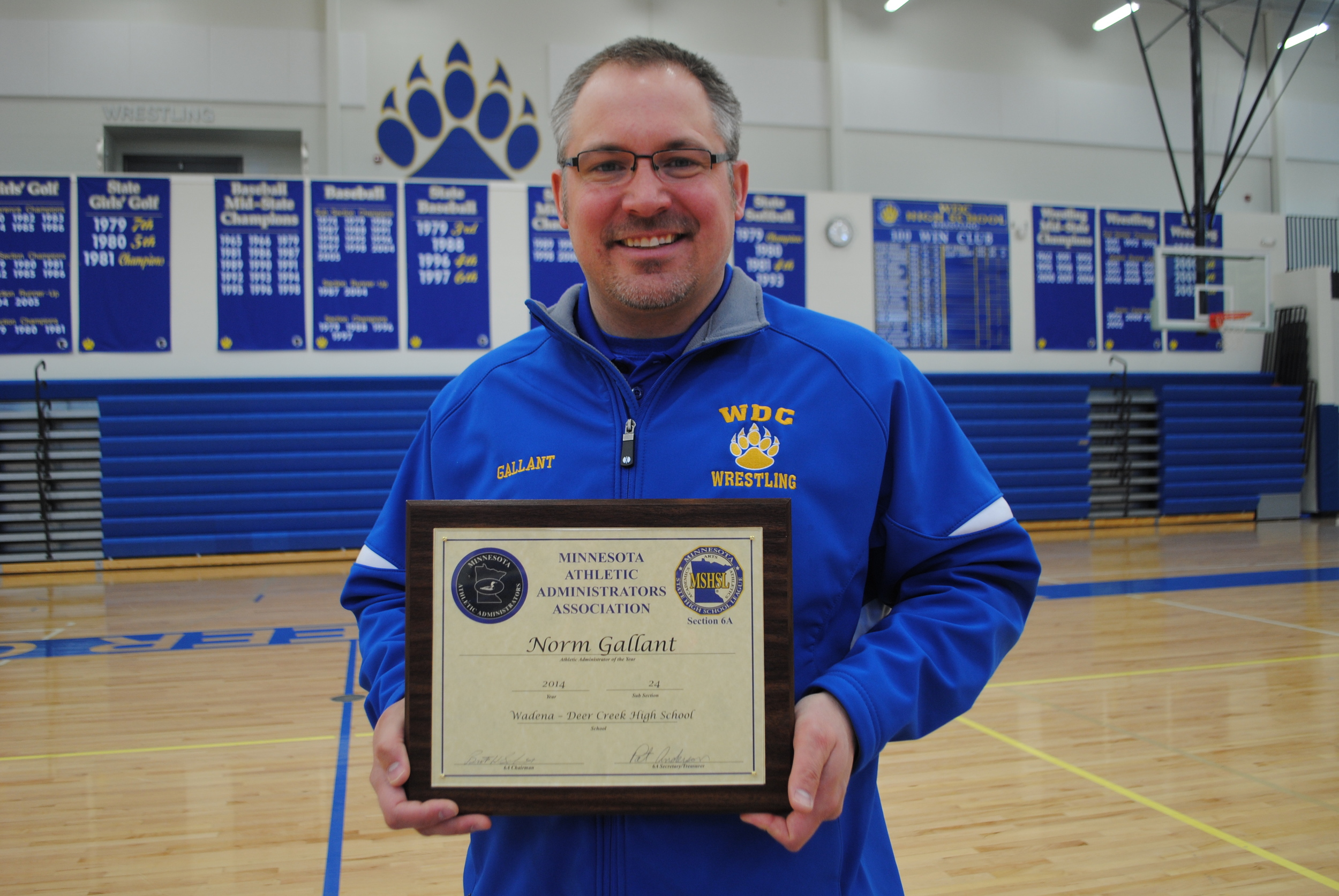 WDC Activities Director Norm Gallant was honored recently as Sub-Section 24 “Activities Administrator of the Year” at the MnIAA convention, March 25 in St. Cloud. (Photo by Dana Pavek, WDC Schools)