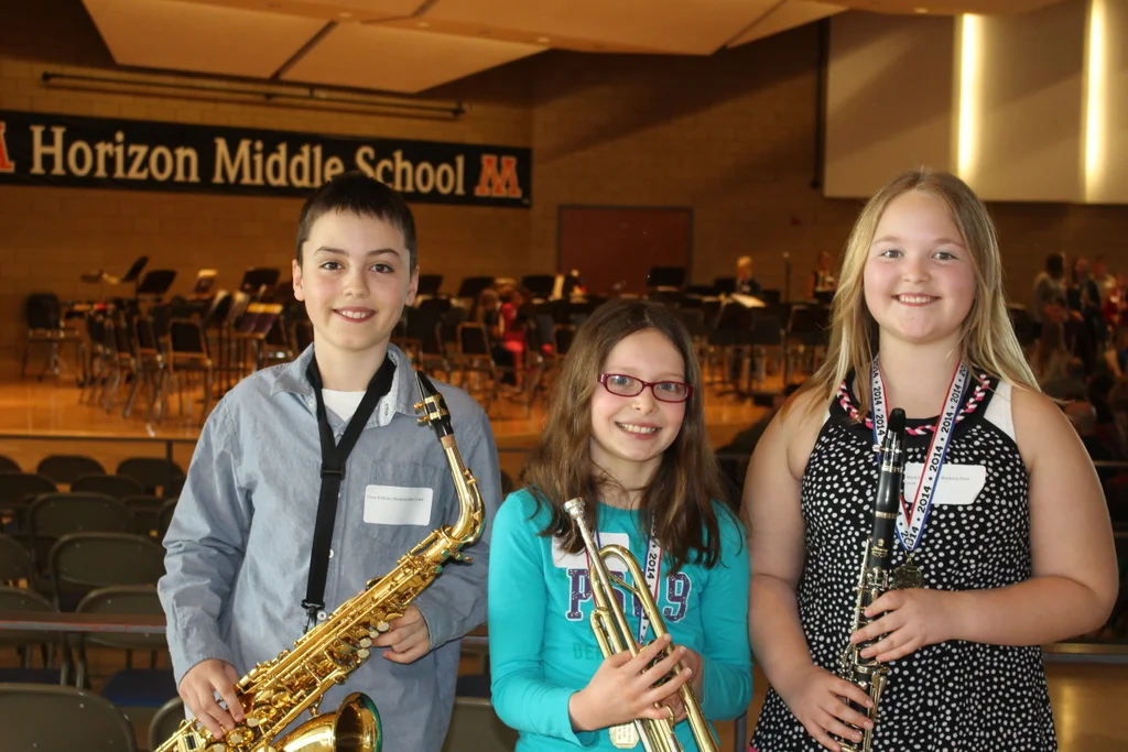 WDC fifth-grade band students performing at the band festival in Moorhead were, from left: Tony Kreklau, Tess Jones and Nevada Schulz. (Photo by Matt Jones)