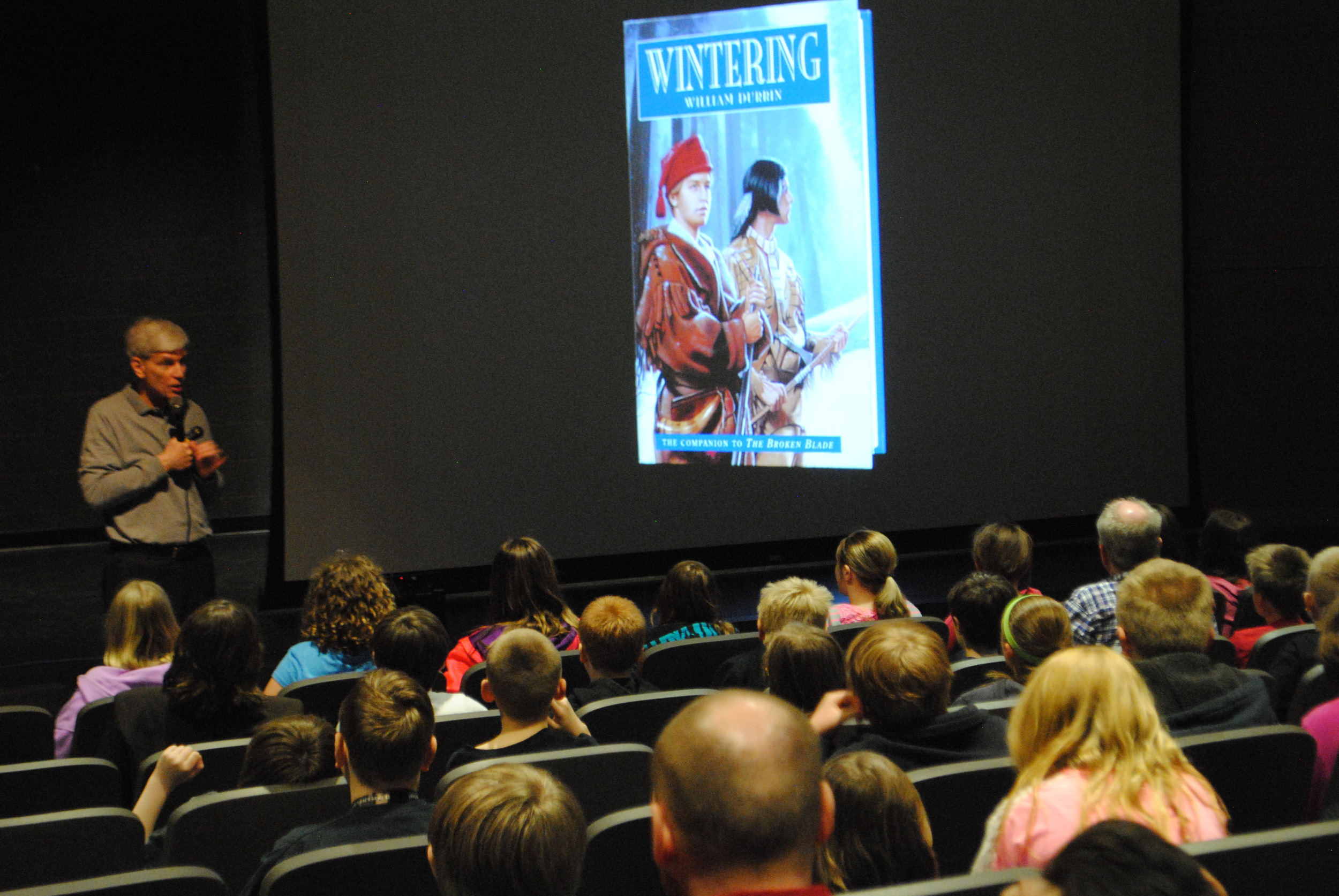 William Durbin gave an insightful presentation to middle-school students recently about his books, the extensive research he puts into his novels, as well as advice for students: write, write, write! That's how you get to be a good and great writer, he said. (Photos by Dana Pavek, WDC Schools)
