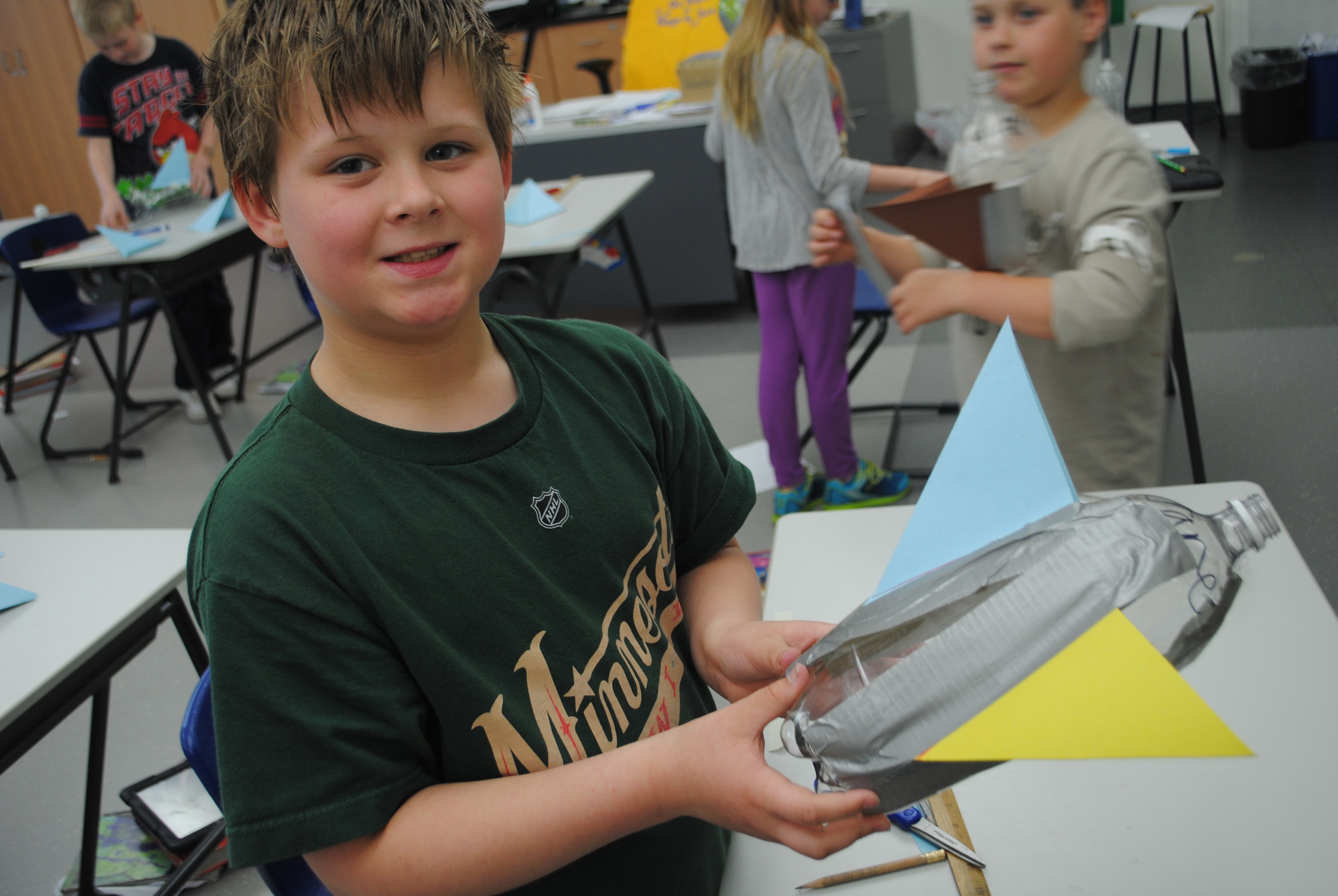 Alex Lunde shows off his rocket that he’s fitted with fins. 