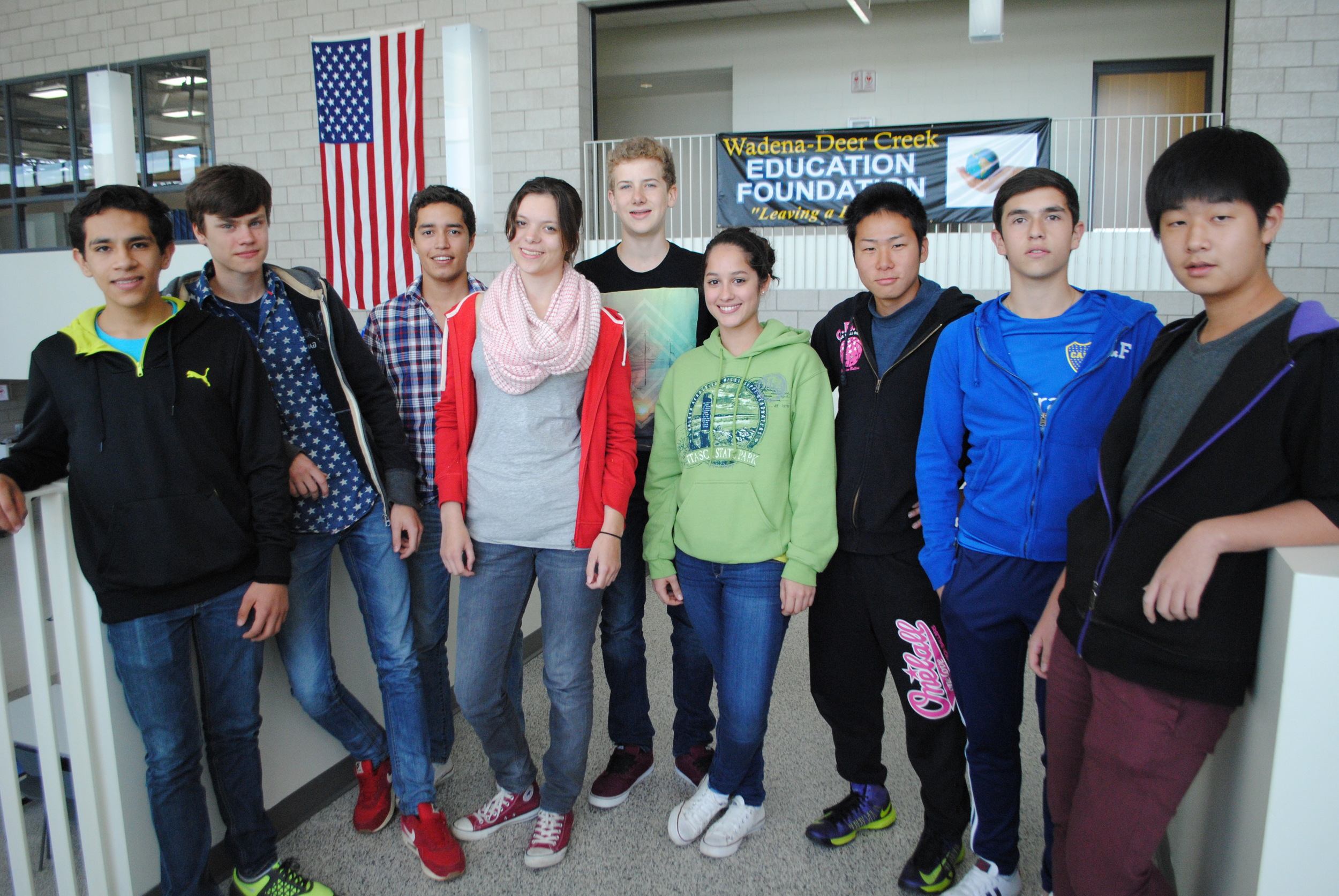 WDC High School welcomes nine foreign exchange students for 2014-15 school year. From left to right: Jose Sandoval (Mexico), Mika Petersenn (Germany), Diego Anzures (Mexico), Laura Stangenberg (Germany), Neil Bachmann (Germany), Gabriela Noronha (Brazil), Kota Nishida (Japan), Joaquin Gutierrez Vargas (Bolivia), and Seons Yoon “Luke” Kim (South Korea). (Photo by Dana Pavek, WDC Schools)