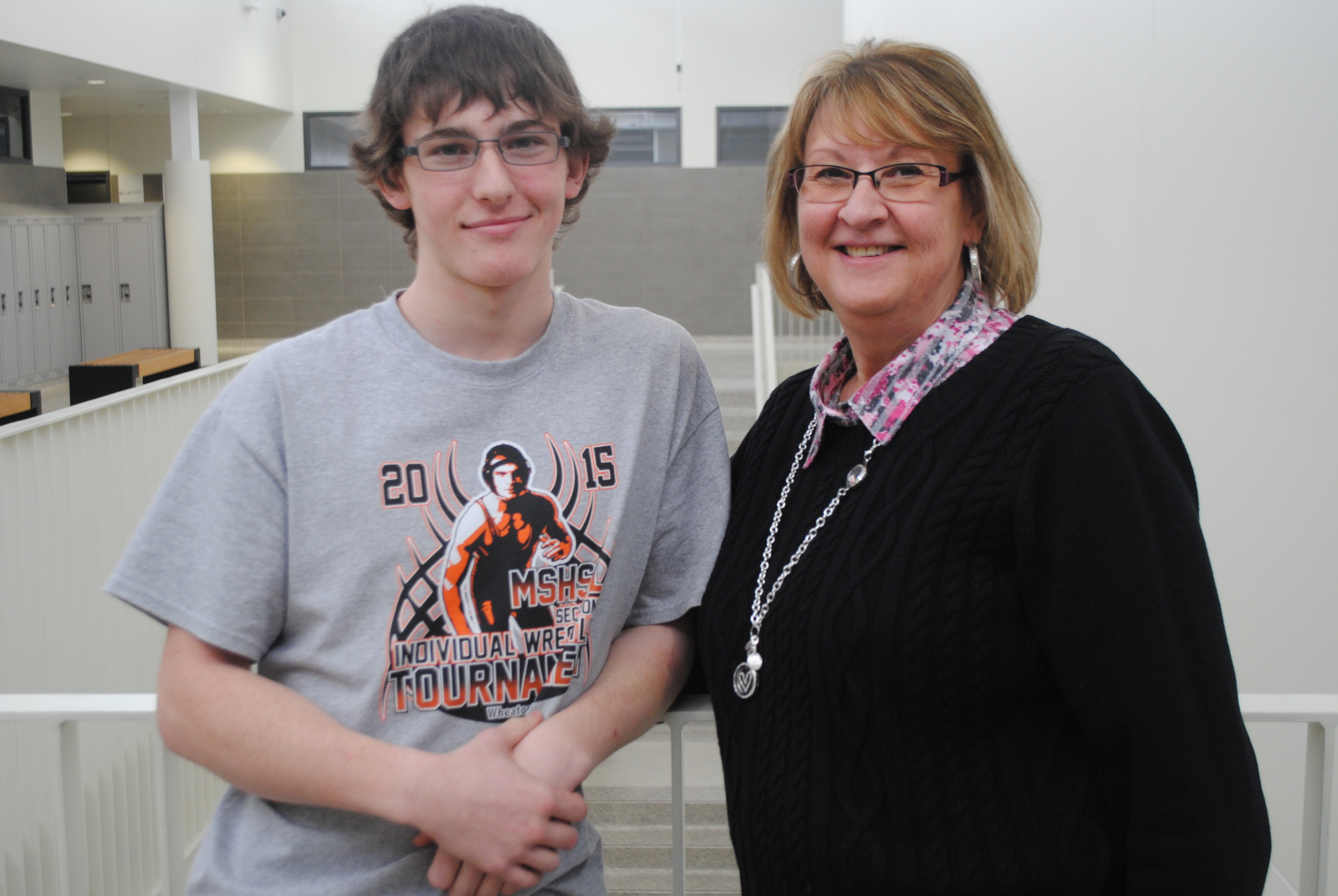 A very proud Deb Wright (WDC Middle/High School paraprofessional) is pictured here with her grandson, Carter Wright, who advanced to the State Wrestling Tournament after having an incredible Section wrestling tourney last week. Carter will have a huge fan club of family members at the tourney on Friday and Saturday to cheer him on in St. Paul. Photo by Dana Pavek, WDC Schools