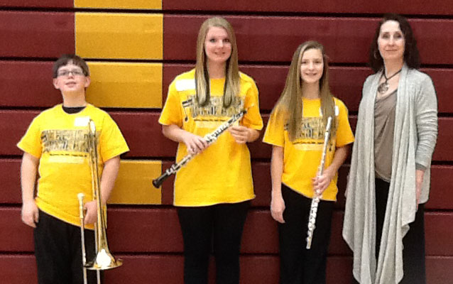 Grades 6-8 Yellow Band featured WDC students, from left: Sean Carlson, Kamea Schreves, Mackenzie Carsten and Dr. Amy Roisum-Foley, Director of Bands from Mankato State University. (Photo courtesy of MBDA)