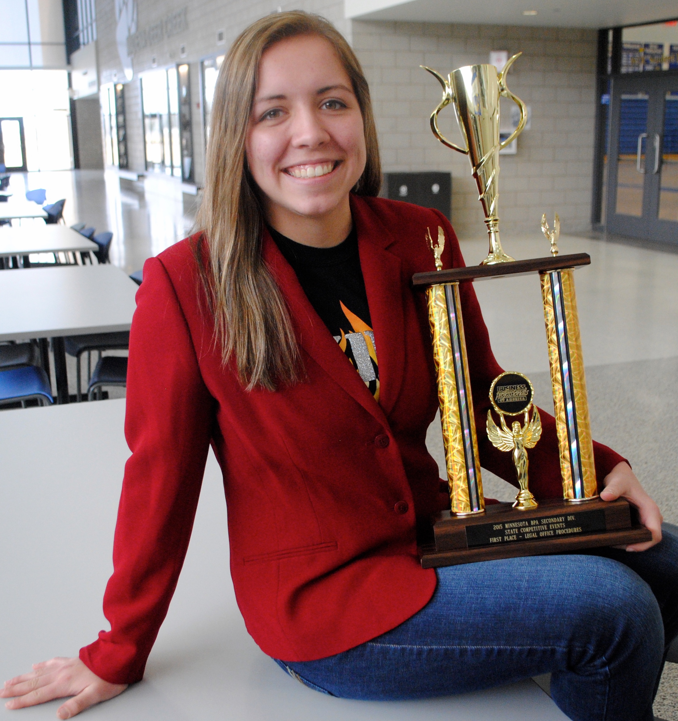 Maddy Hinojos, a senior, qualified for the National Leadership Conference May 6-9 in Anaheim, Calif. She is shown here with her State BPA trophy, where she earned first place in the “Legal Office Procedures” category.