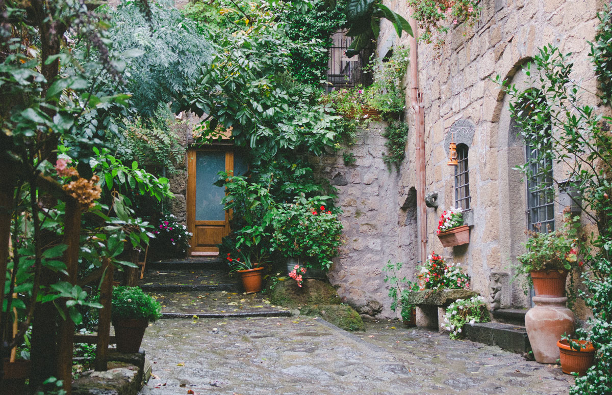 Plant lined streets in Civita di Bagnoregio, Italy