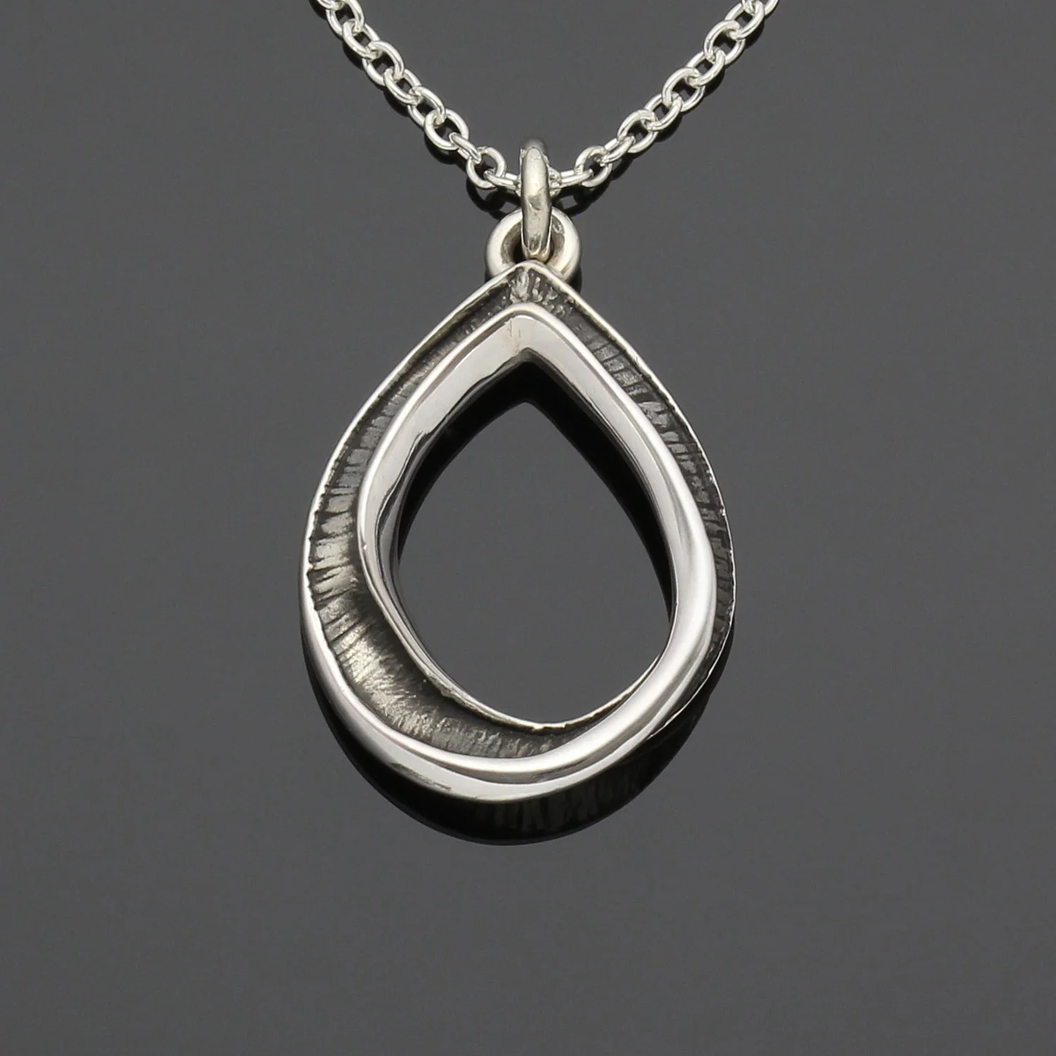 #159 Mobius Pear pendant