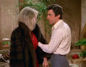 Nick is not happy to lose Krystle, but at least she has on a different fur!