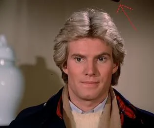 Also, gotta love that hair from the 80s