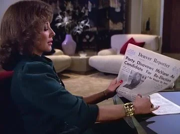 Boy, does Alexis love reading the paper. Who needs the internet
