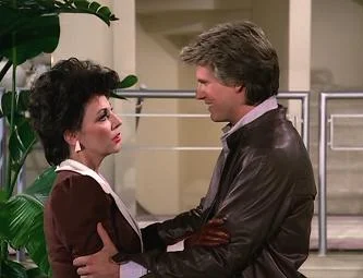 Love that 80s hairstyle!