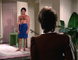 Gratuitous shot of Adam in a towel
