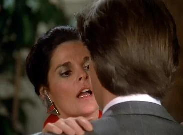 Ali Mac Graw is going in for the kill - what the hell is that!