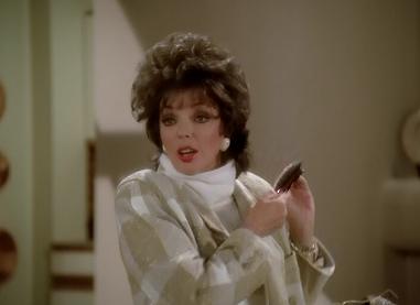 Forever brushing out her mullet.