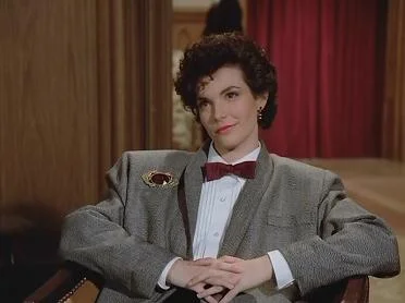 Who the hell is dressing Leslie - this is something a ring master at the circus would wear.