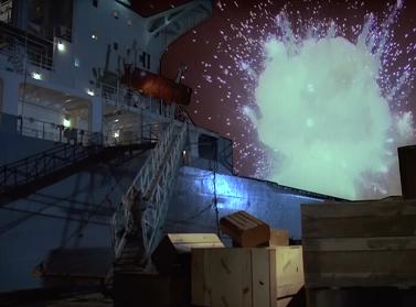 Why is the explosion behind the ship?