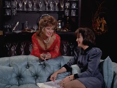 Joanna and Sable have a good laugh over Sable's cleavage