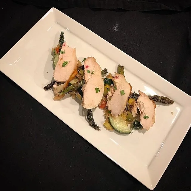 Pan seared chicken breast over a quinoa Greek salad and roasted asparagus topped with pandemic grown micro greens #pantryandfridge