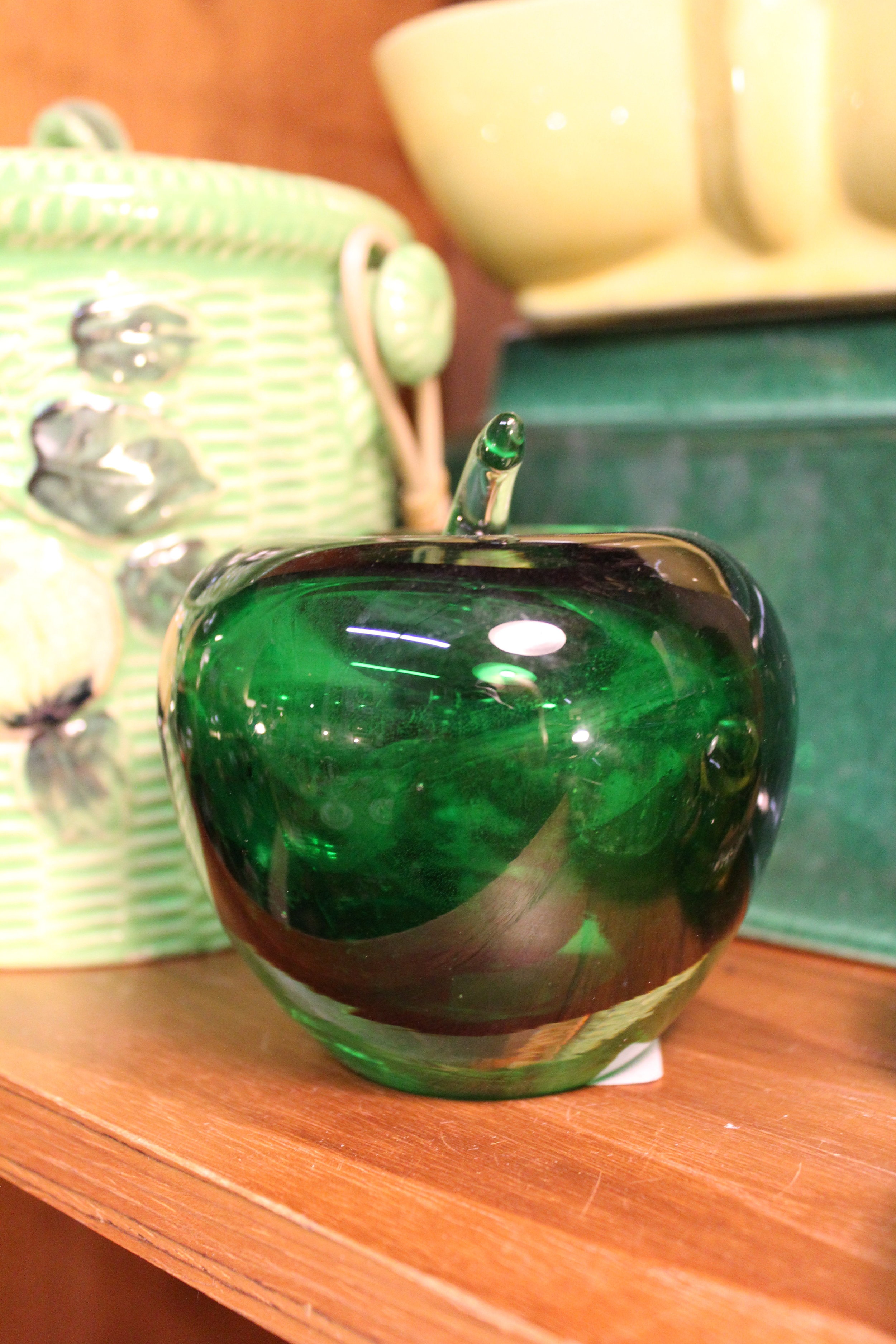 green glass apple paperweight