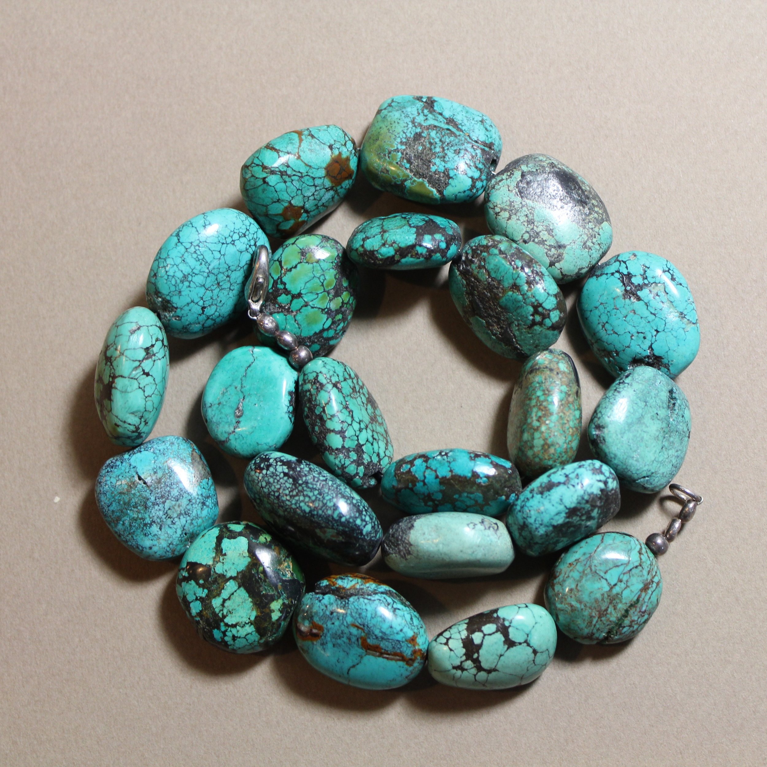 blue stone necklace coil.jpg