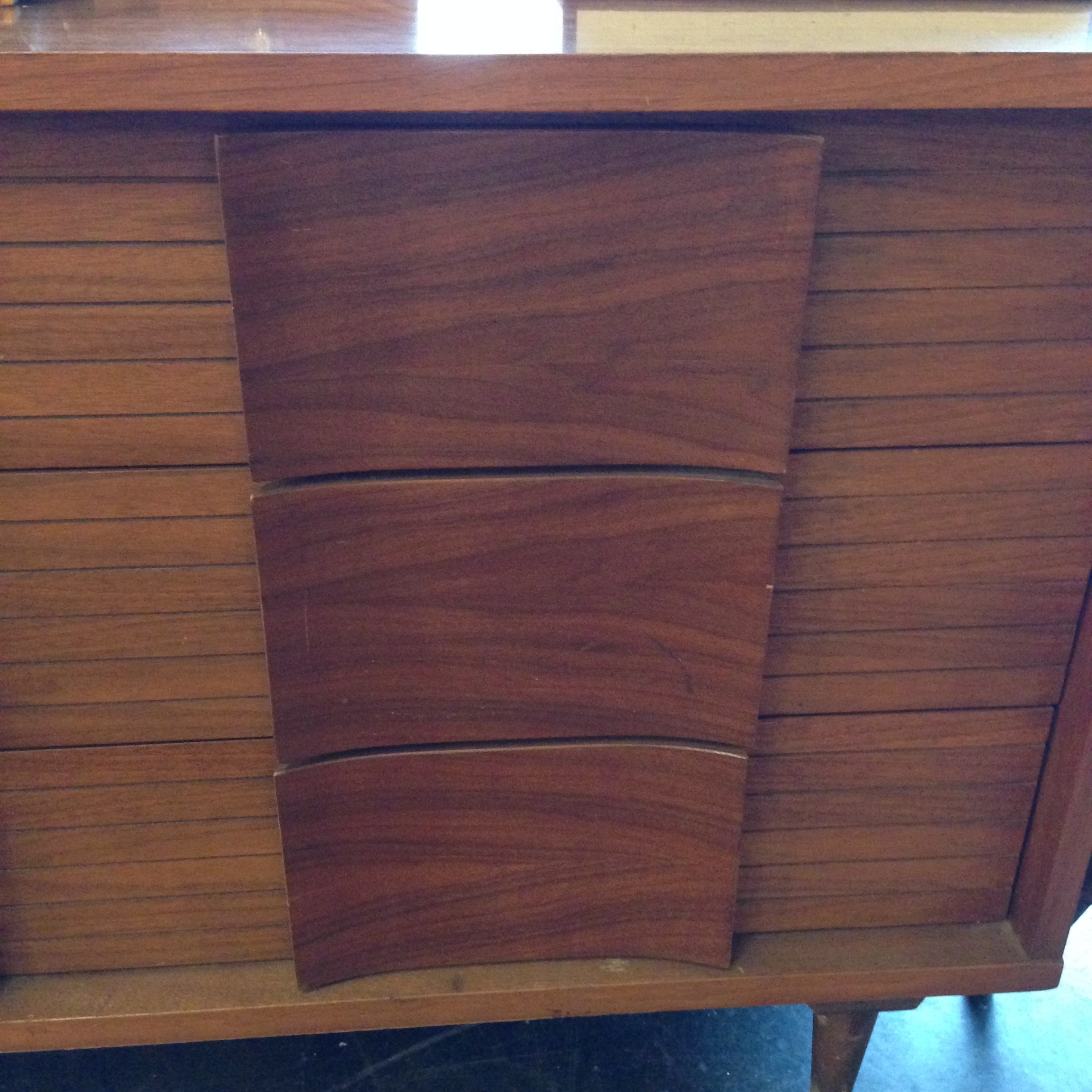 cose up of midcentury modern wood bureau