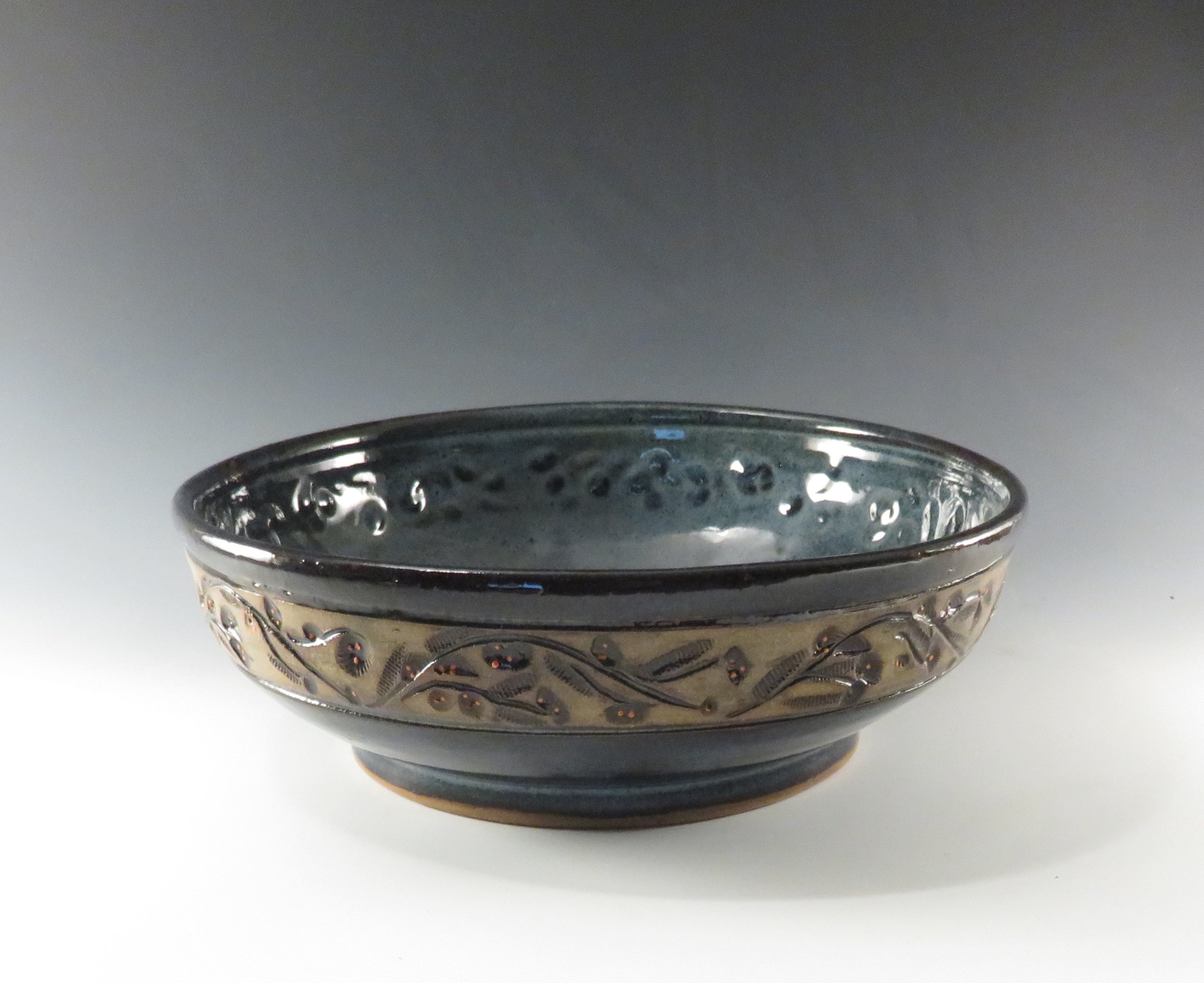 Wide serving bowl with outside flower vines