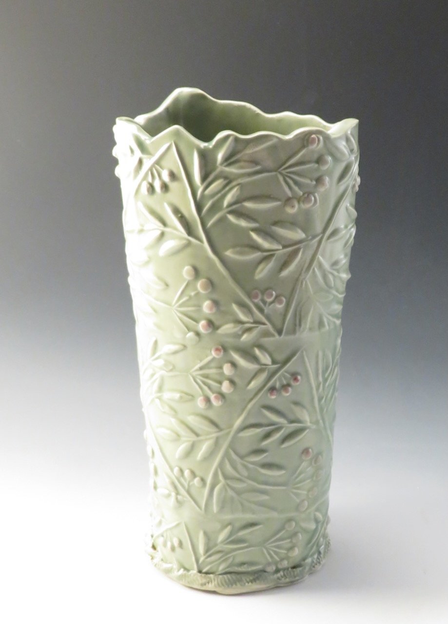  Hand built McGuire green vase with pink berries. 10” x 4” 