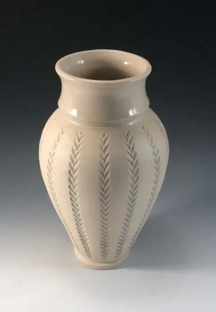 10” white vase with green stiching
