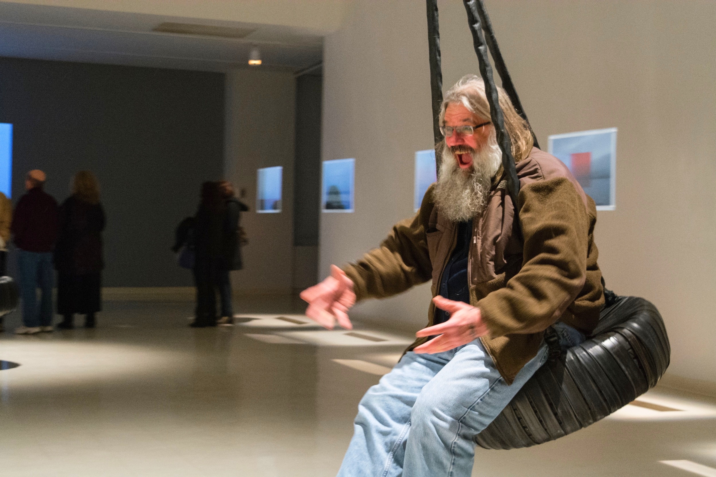 Man enjoying a swing on North
