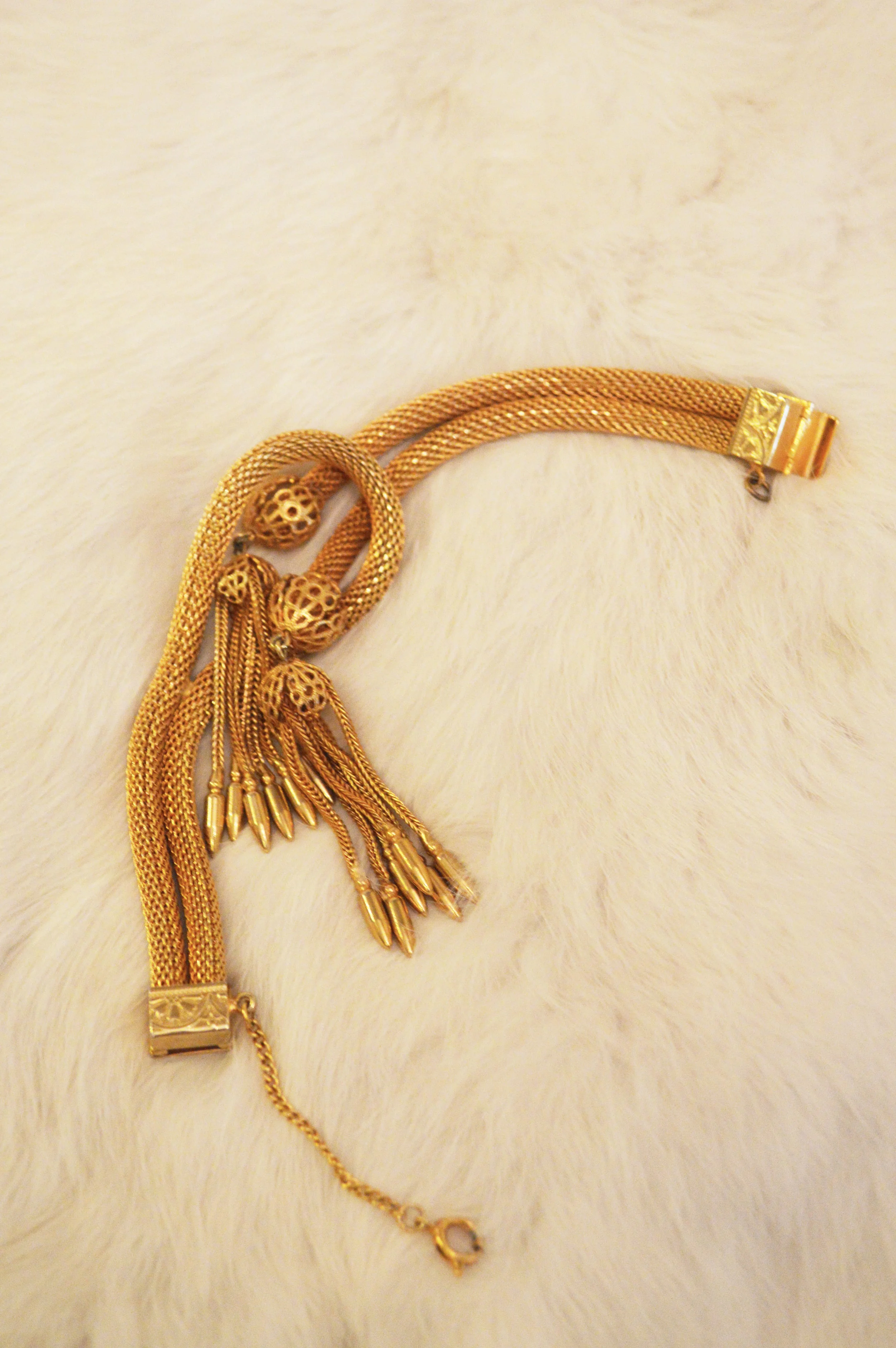 Hobe gold tassel bracelet $120.jpg
