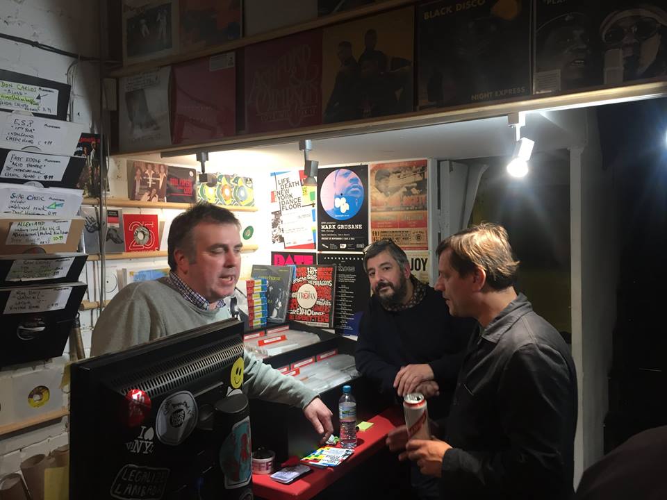The guys at Love Vinyl--surrounded by the music they love....jpg