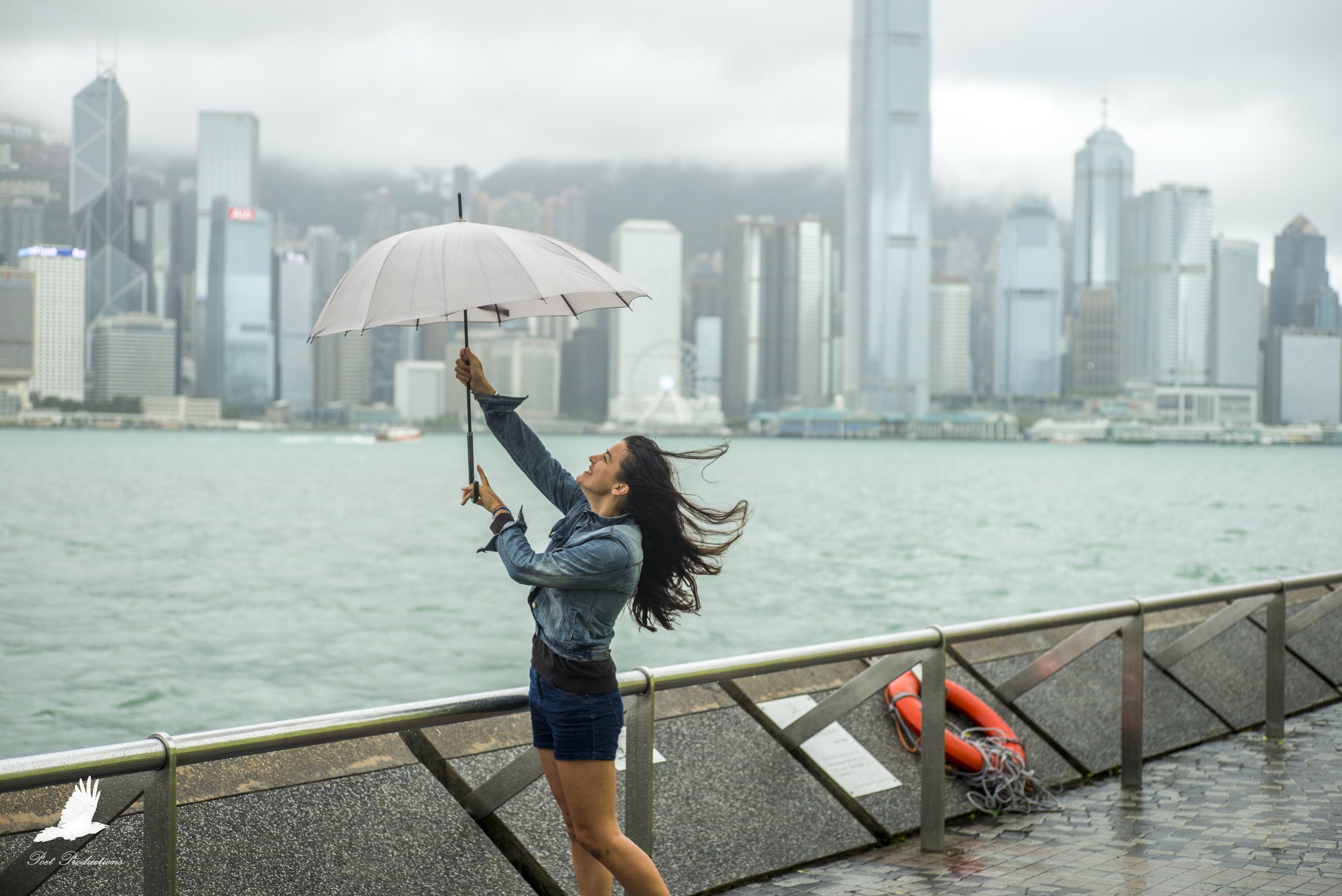 The rain gets heavy so I give her my umbrella