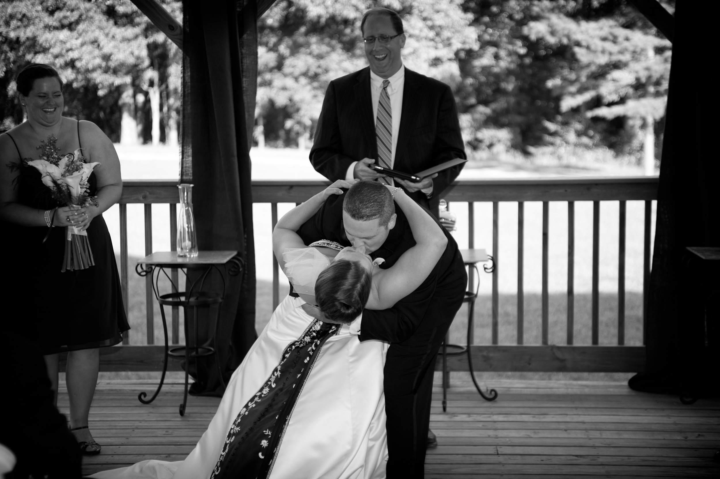 Bride and Groom Kiss at Winery - Peter Farrar