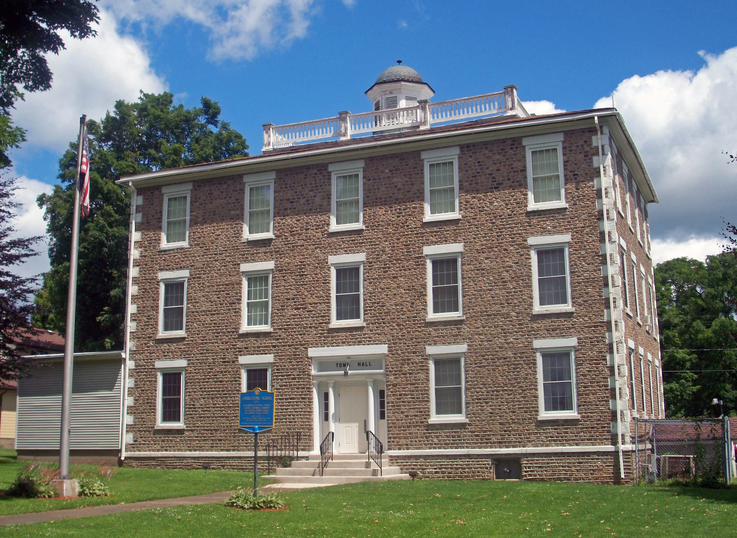 The Alexander Classical School three-story cobblestone building in Alexander, NY.