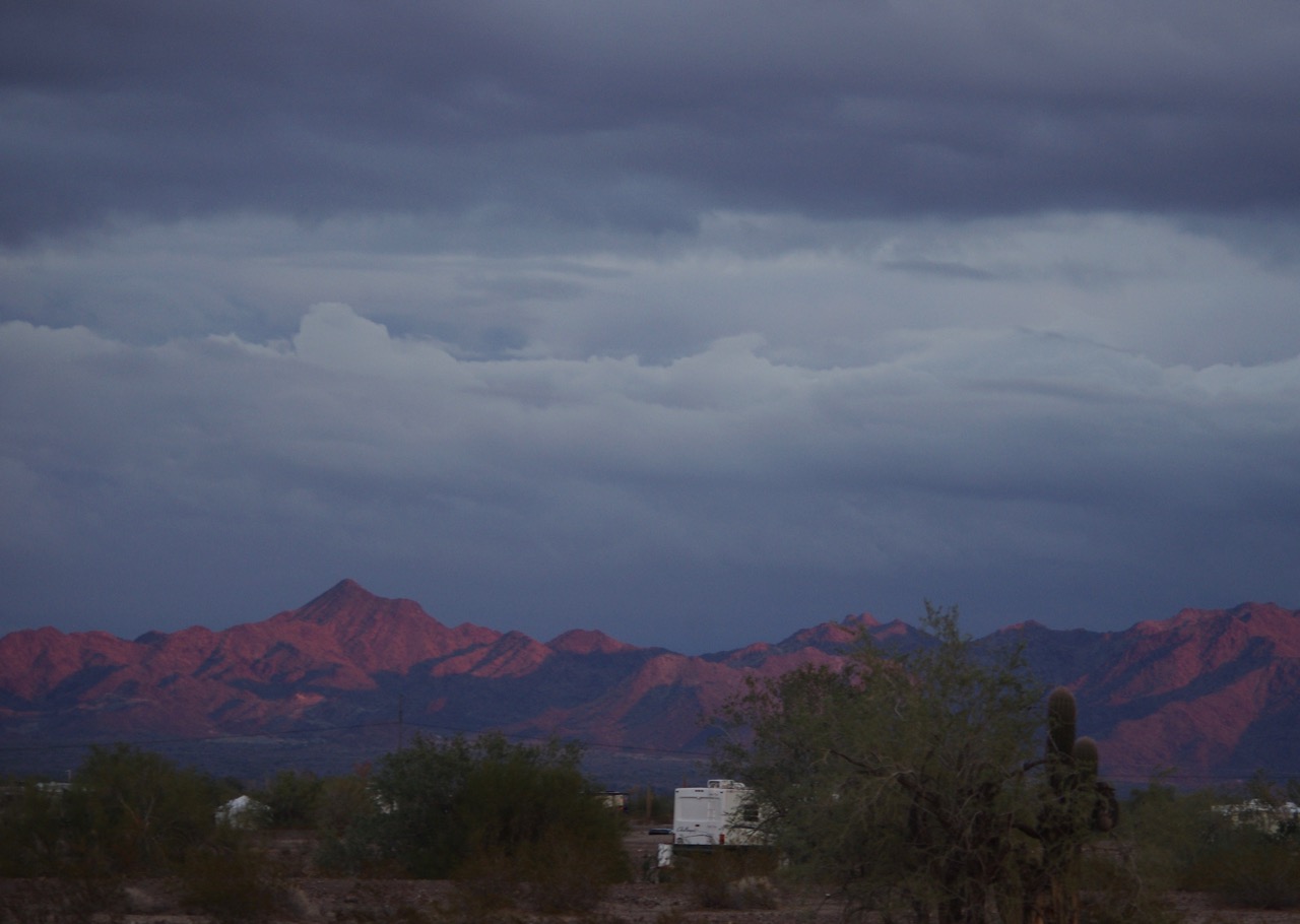 All my life, I've been trying to capture the effect of the sunset on the mountains and failing. This, however, is pretty darn close. The RVs are, of course, my neighbors, who parked right between me and the mountains.
