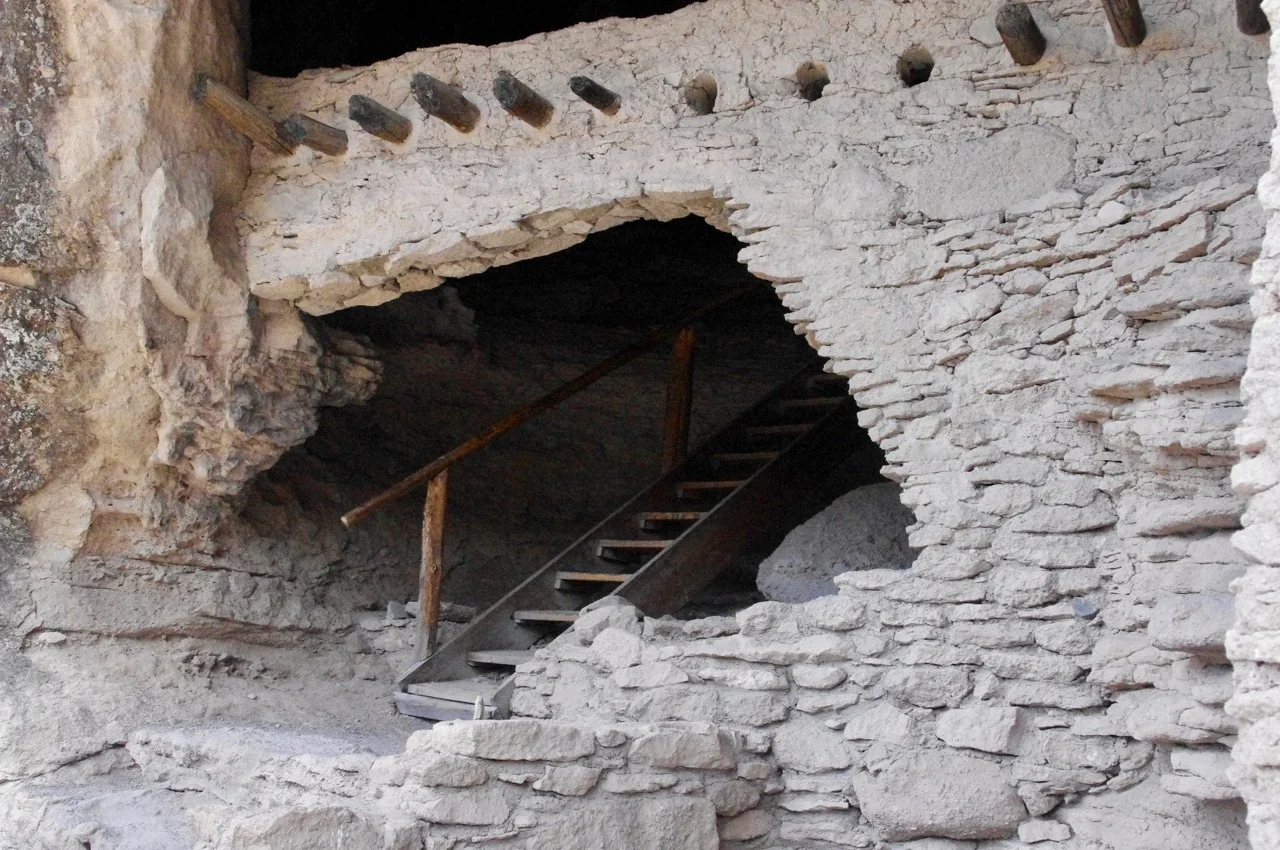 In case you have temporarily lost your mind and think that these lovely stairs disappearing into the gloom of the cave might have been used by its ancient residents, no, they are a modern addition by the Dept. of the Interior to enable us tourists to climb up into the ruins. 