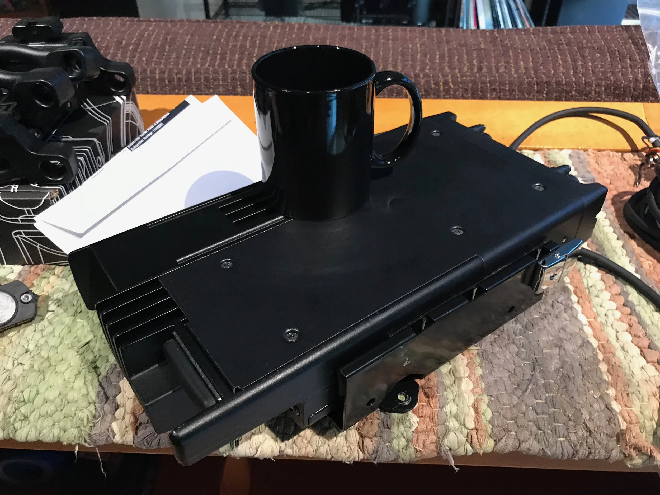 Coffee cup for scale. When I mentioned this radio is big, I was not overstating the truth.