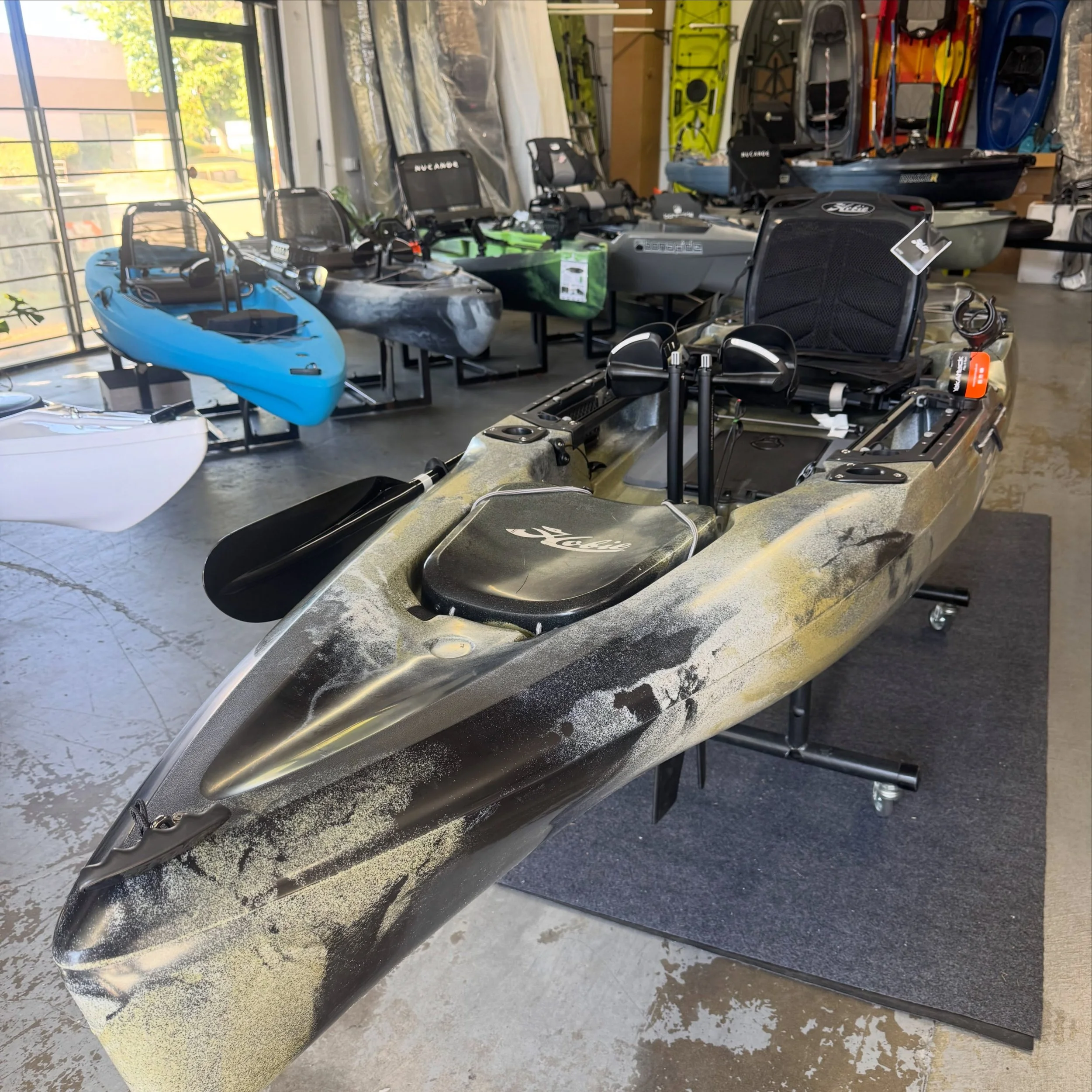 Some shots from around the shop. Come on by! #kayaks #kayakshop #kayakstore #hobie #eddyline