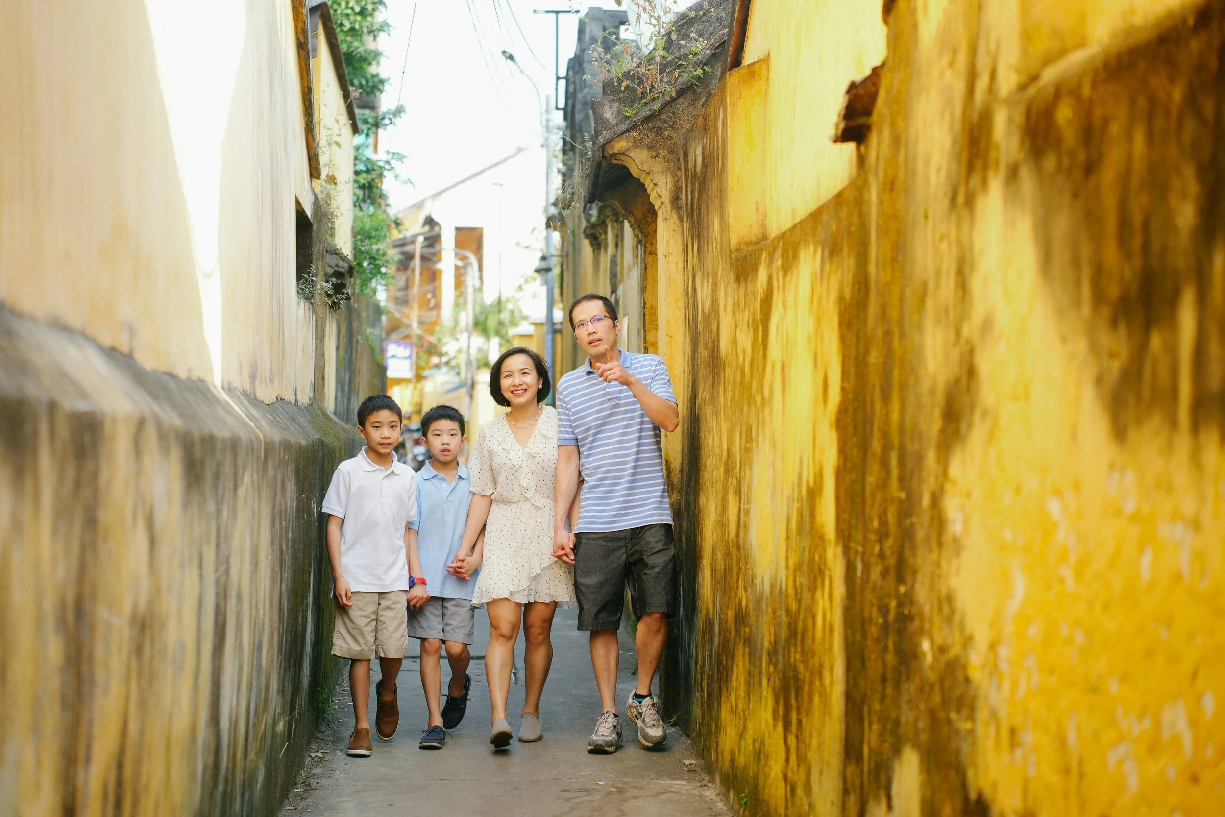 Family with two children walking together