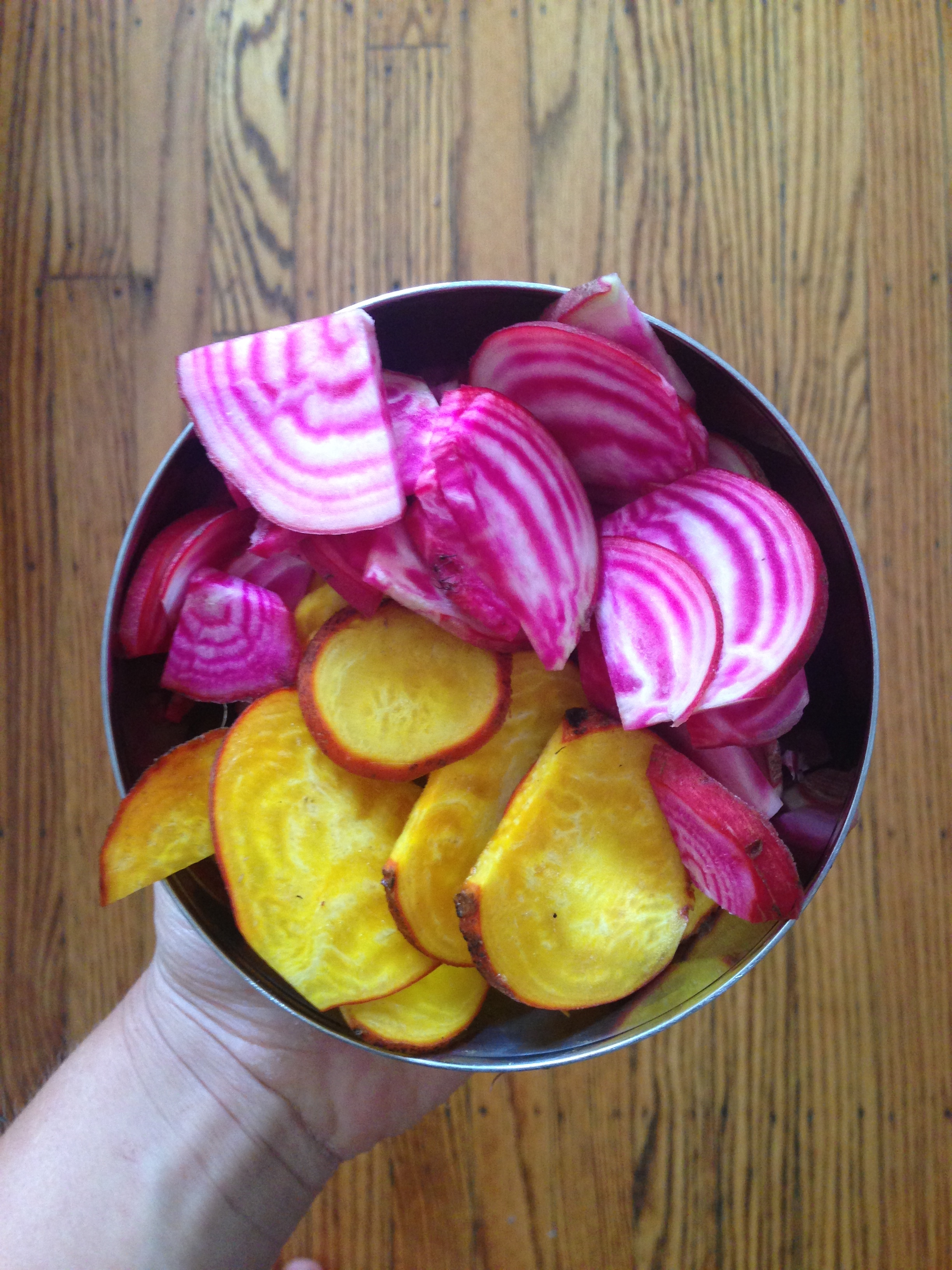 but once ya get all the bad odds and ends off, look at these beauties! Dazzling chioggia and golden beets!